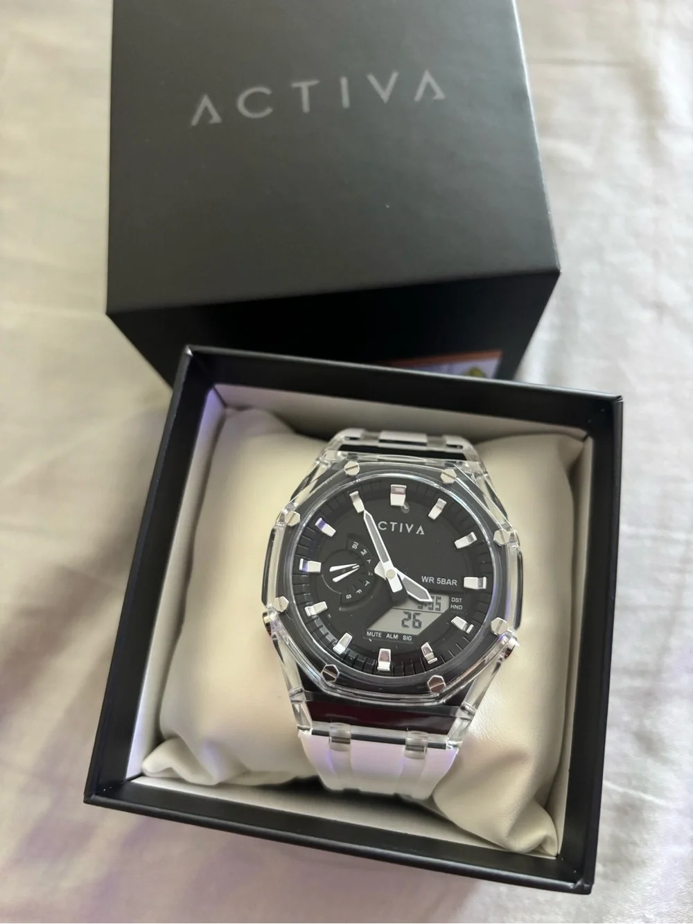 ACTIVA Men's Black Dial Sport Watch with Clear Case and White Band